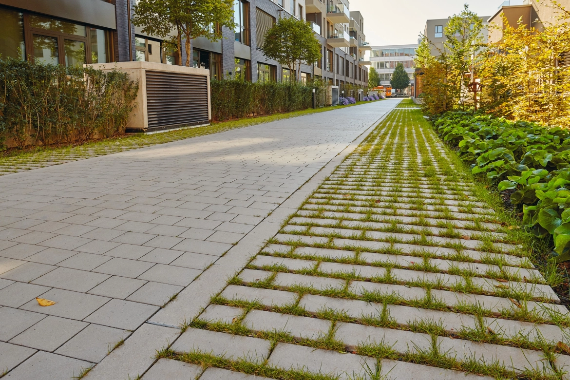 Public property with paving stones and lawn liners at Erlanger Höfe