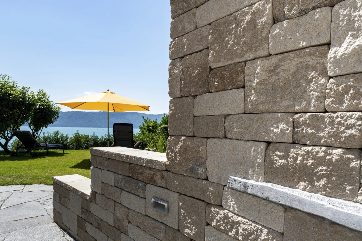 Wall as a privacy screen in a private property by the lake.