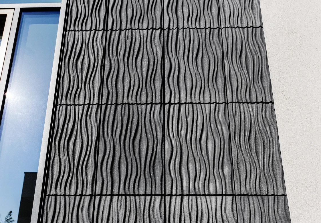 Facade tiles made of GODELMANN architectural concrete in the color anthracite