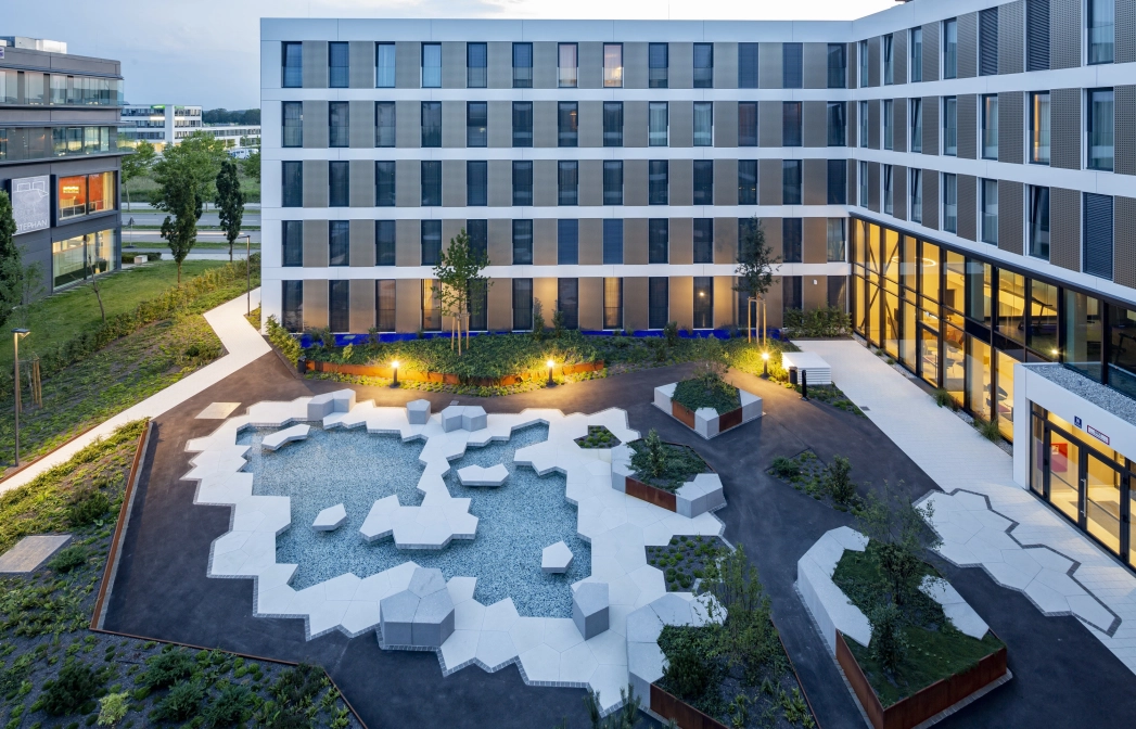 hotel building inner courtyard architecturally planted