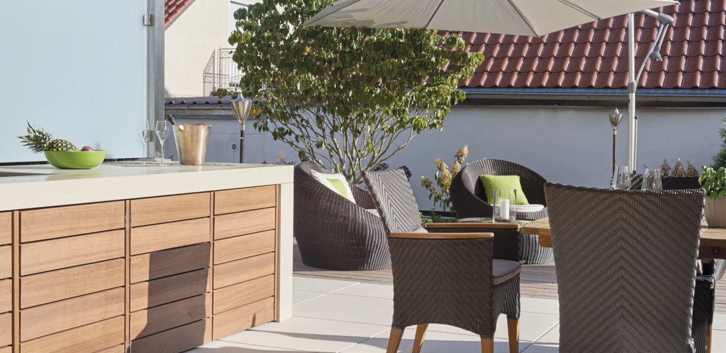 Outdoor kitchen on a terrace in the color sandstone