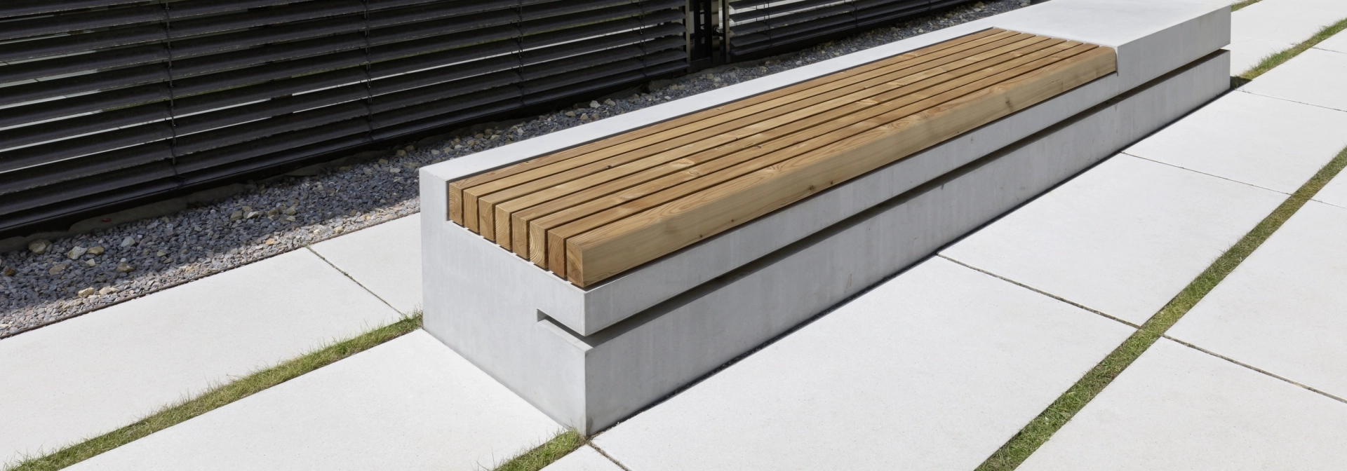 Concrete seating element with wooden support