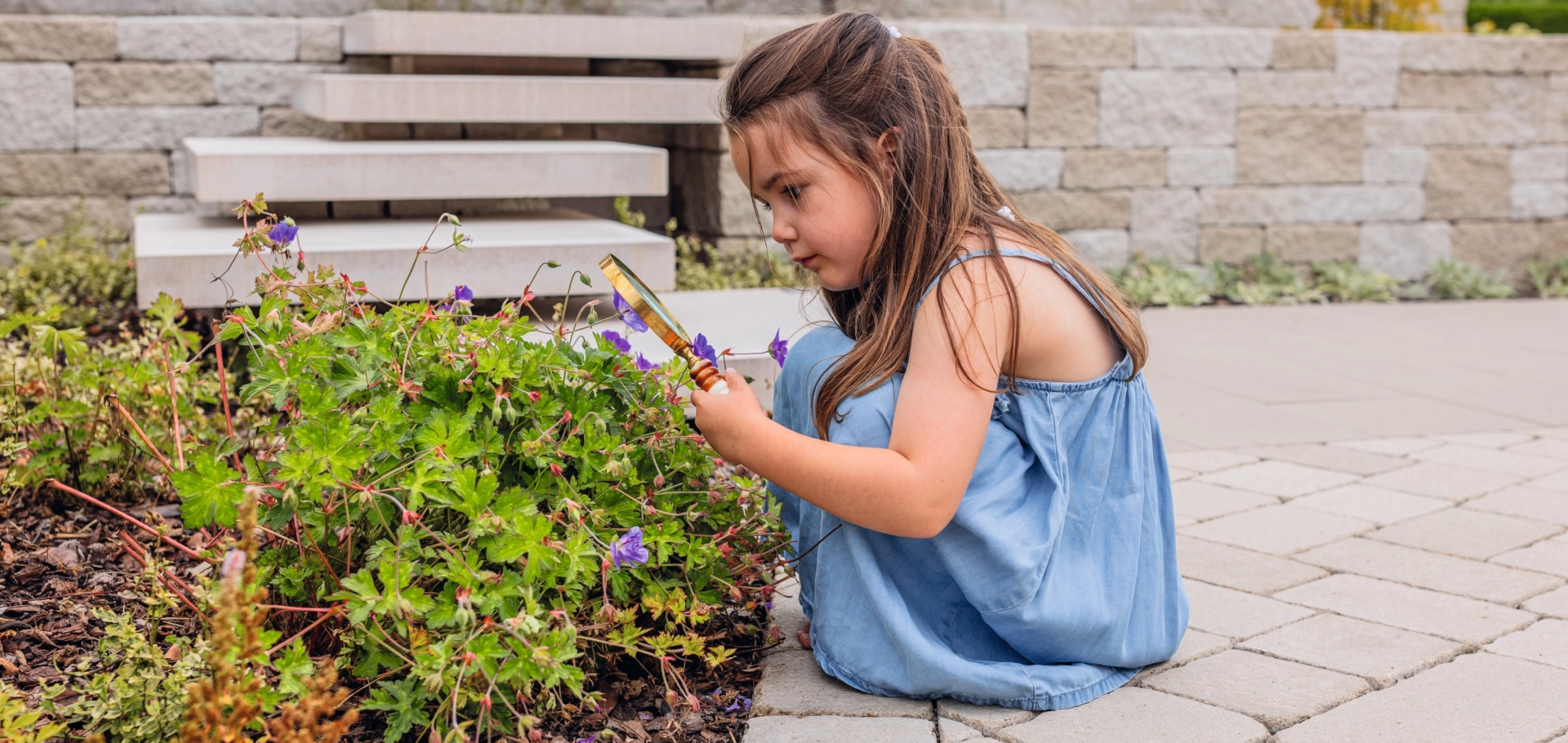 Godelmann Ideengarten, Kind mit Lupe 