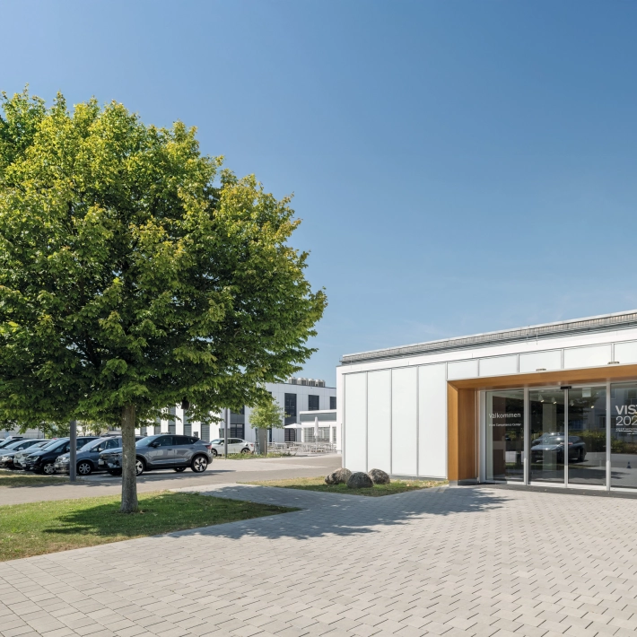 Infiltration-capable driveway to a car dealership
