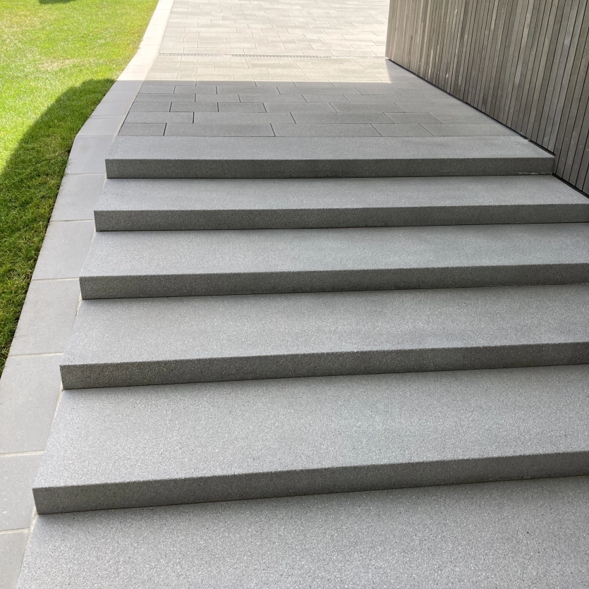 Steps leading up to a paved area.