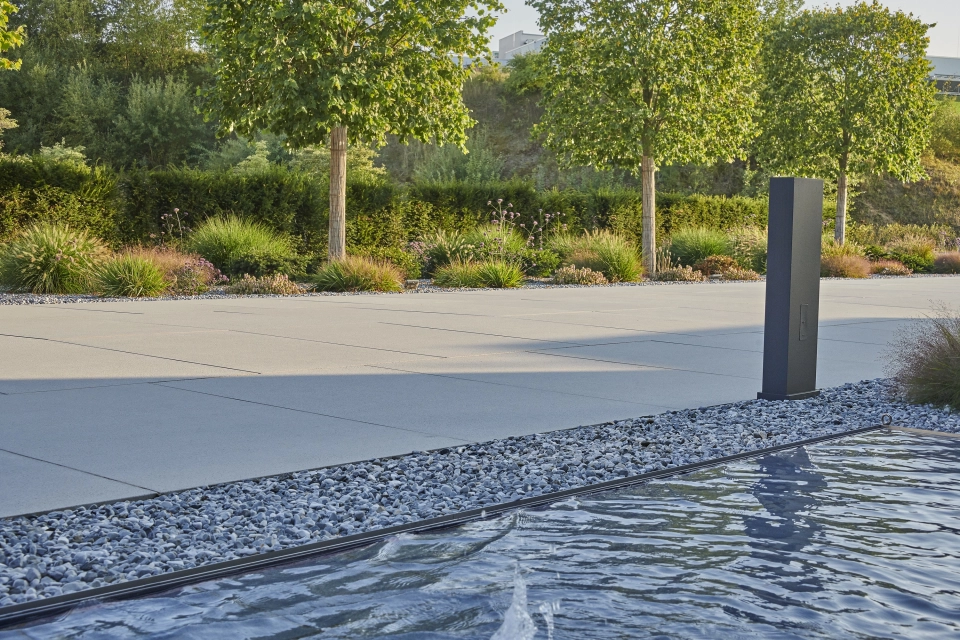 company entrance space planted