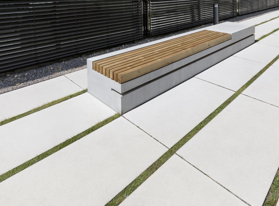 Concrete seating element with wooden support